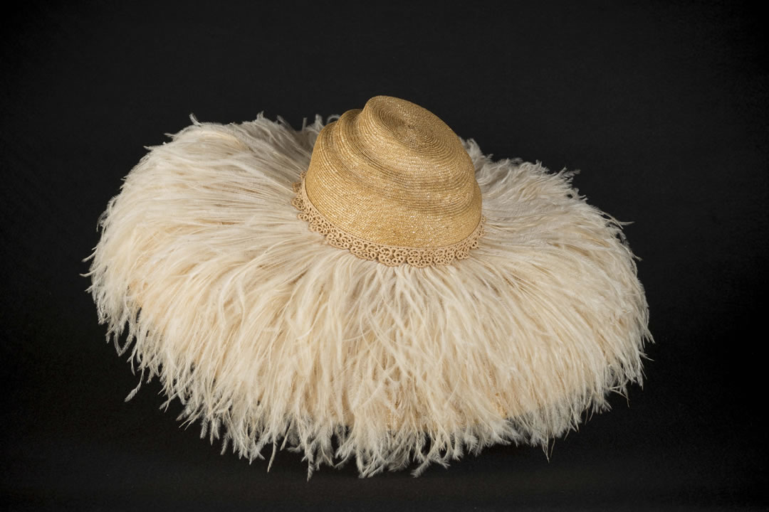 Hand made mottled capeline with ostrich feathers, and italian guipur lace