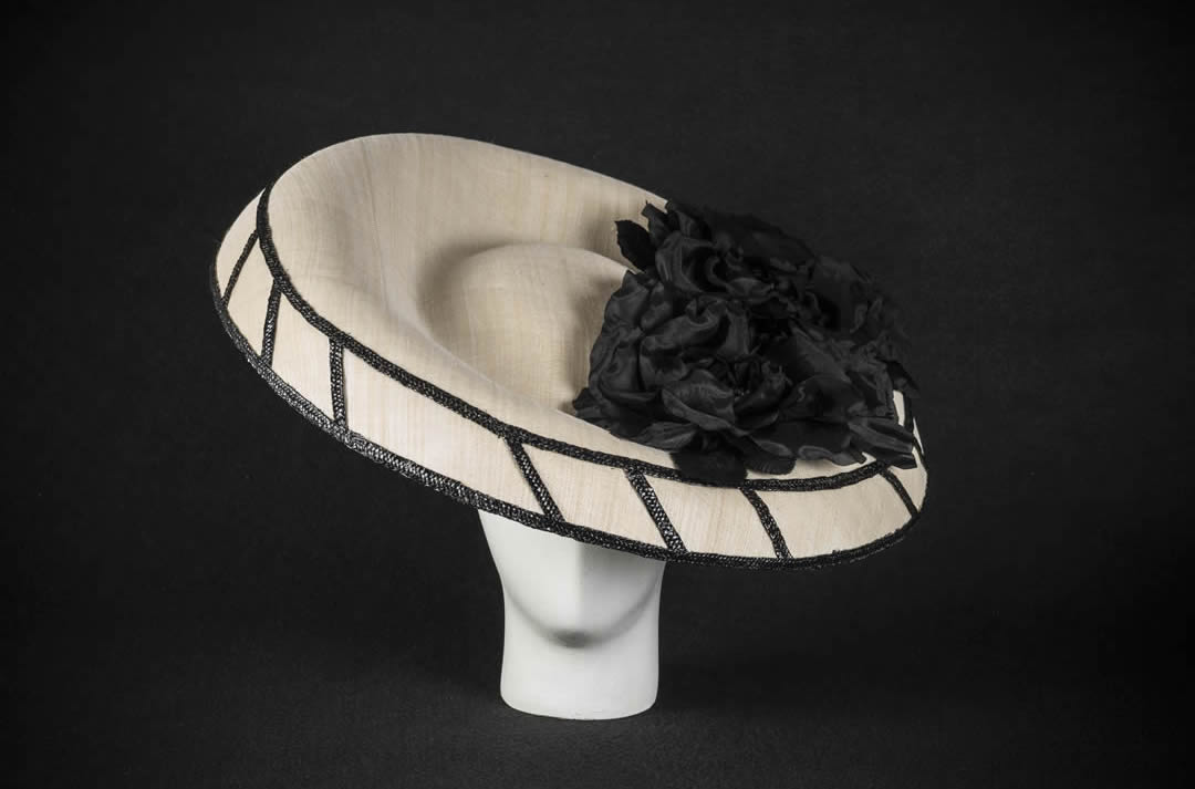 Silk sinamay hat with wheatstraw braids and hand made silk flowers