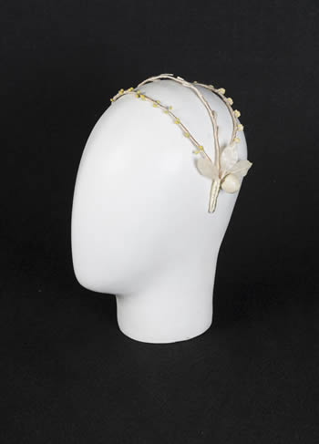 Wired fascinator with stamens and wax leaves