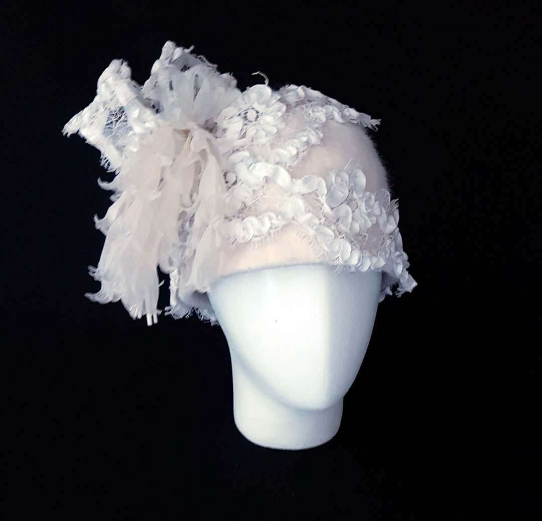 Toyo hat with hand made silk orchides.