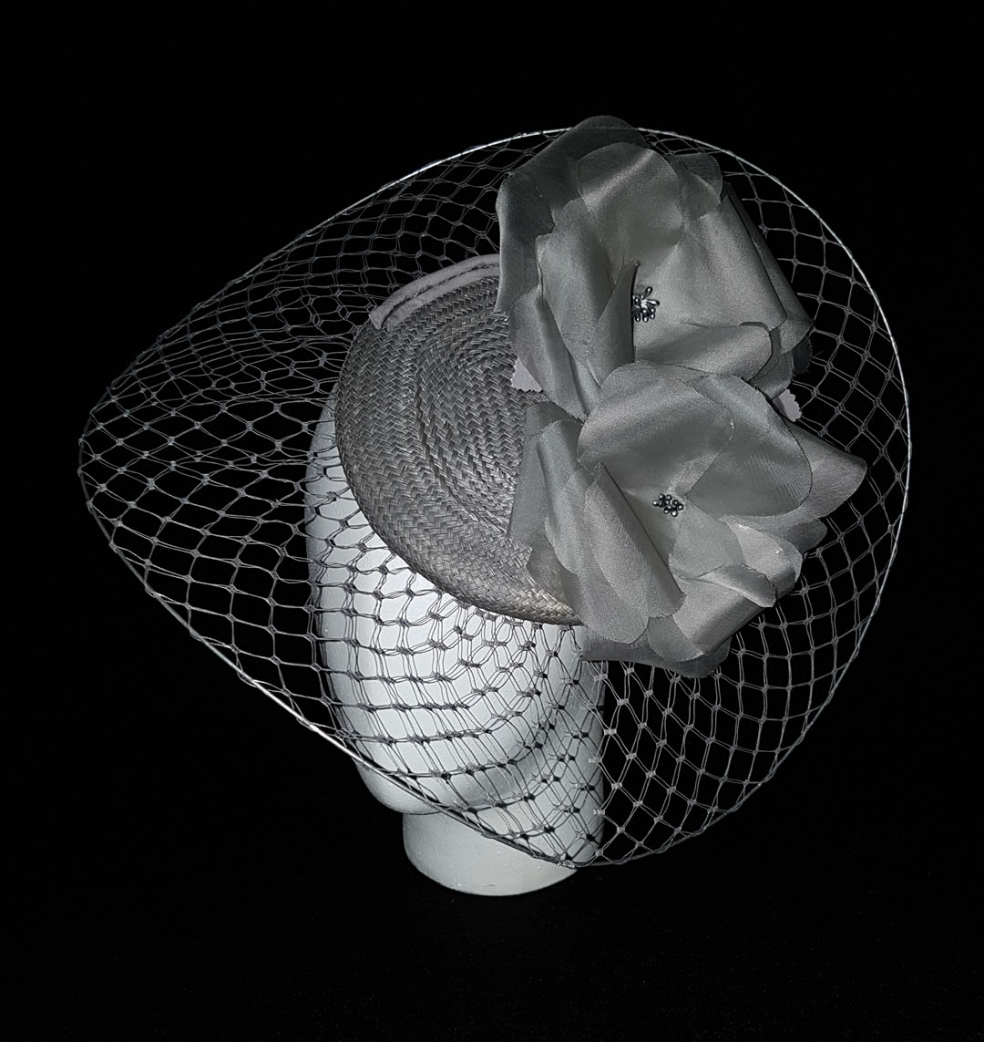 Buntal and wired veiling hat with hand made silk flowers