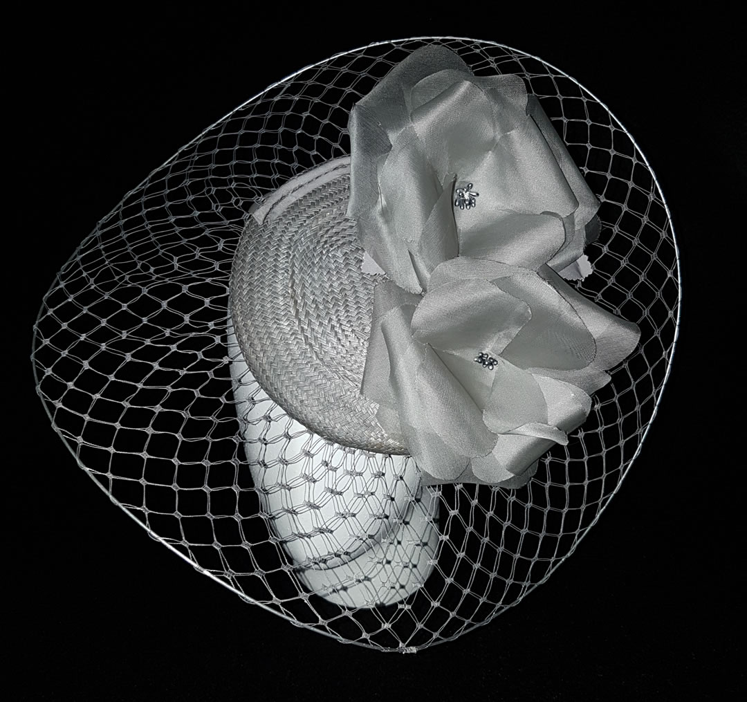 Buntal and wired veiling hat with hand made silk flowers