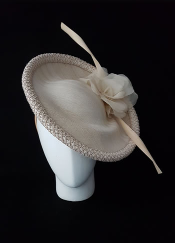 Silk sinamay hat with natural fiber, braid and a hand made silk flower