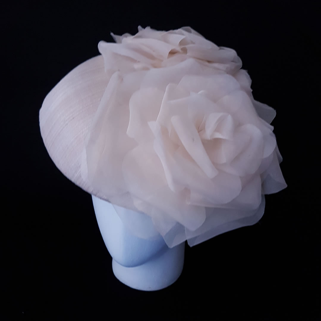 Silk sinamay hat with hand made silk flowers