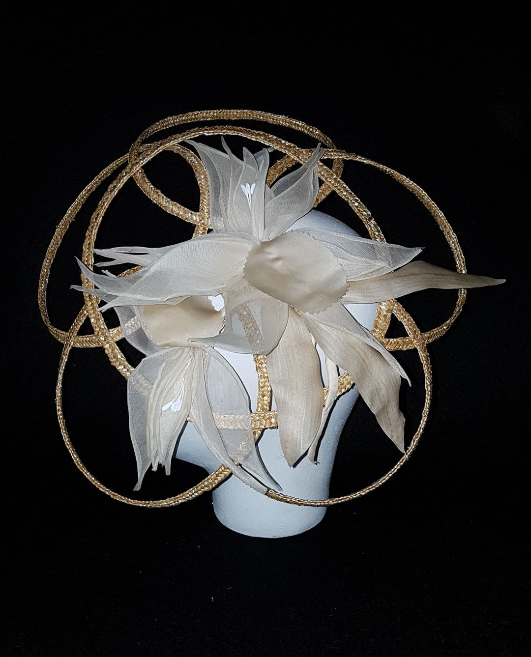 Geometric wired weatstraw braids hat with hand made bunch of silk flowers